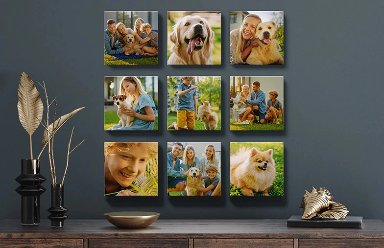 Couple in front of a blue wall with nine square photo canvases