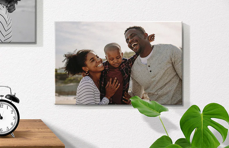 ["Personalised Photo Canvas Prints by Printerpix", "Collage Canvas Print of Two Happy Friends", "Canvas Print Sizes", "Mother Lovingly Kissing Her Young Son on Canvas Print", "Gallery Wall with Canvas Prints", "Canvas Print of a Couple Enjoying Their Holiday", "", "", "", ""]||||||||||